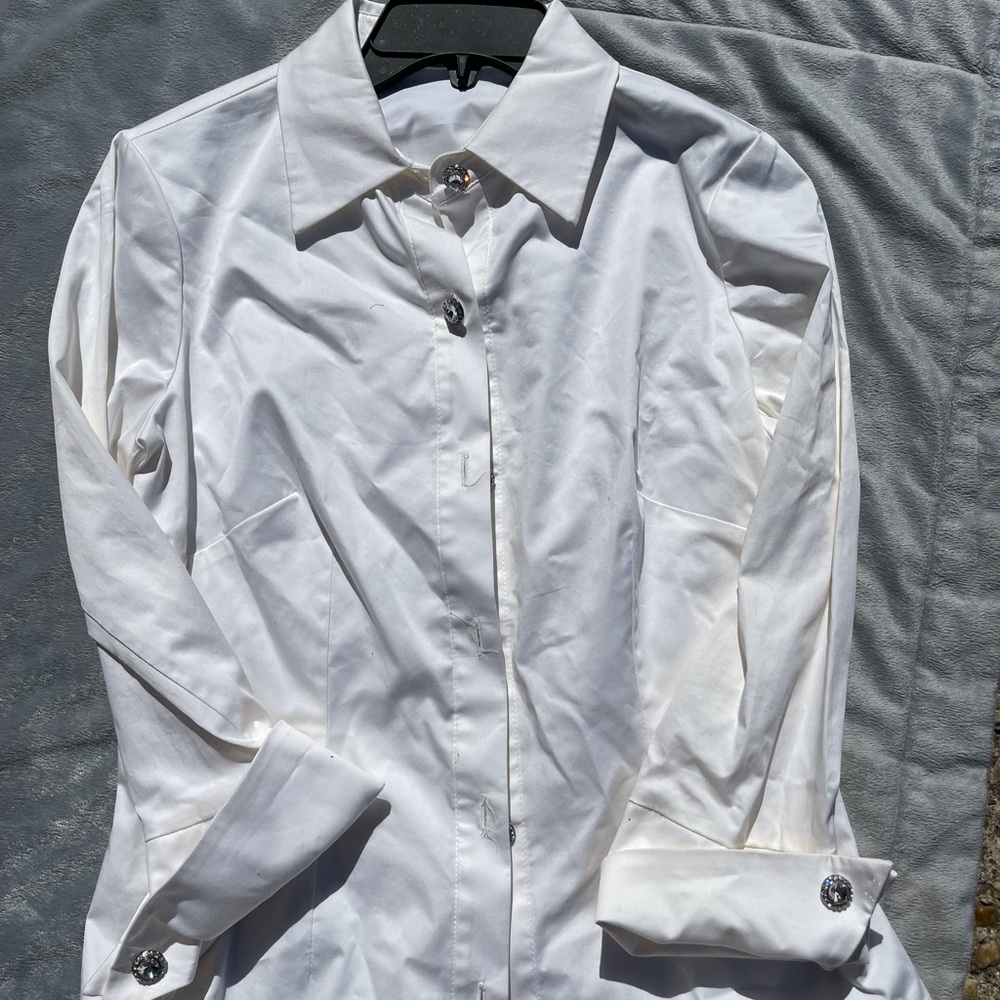 Long sleeve, button down shirt, new with tags size 6.